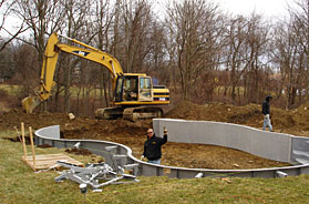 Excavation, foundations, demolition, dumpster rentals, lawn installation, landscape design, trucking, clean fill, sand, salt, gravel, topsoil and masonry including stone walls, patios, walkways, stairs, paving and Belgium block.