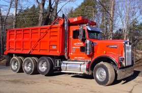 Summit Construction trucking services and dumpster rentals.