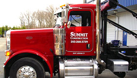 Summit Construction trucking services and dumpster rentals. Free estimates.