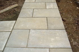 Stone walls, patios, walkways, steps, paving, Belgium block, tile floors, fieldstone walls, flagstone patios in Fairfield County and New Haven County, CT. 